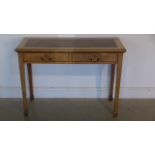 An early 20th Century mahogany writing desk with two drawers - 108cm W x 78cm H