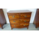 A 19th century mahogany bow fronted chest with two short over three long drawers - 90cm W