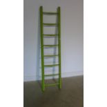 A rustic 8-rung painted ladder, waxed for decorative use - 185cm H