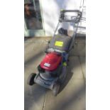 A Honda HRB 475 petrol driven lawnmower, starts and runs, may need a service