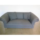 A bespoke made two seater sofa in grey, 70cm H x 188cm x 103cm - with two scatter cushions - cost