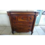 A 19th Century mahogany Scottish chest with a cushion drawer above three drawers and three long