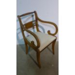 A Regency style desk chair on sabre legs