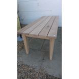 An oak garden table, 212cm long x 80cm wide