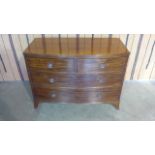 A 19th century mahogany bow fronted chest with two short over two long drawers on played bracket