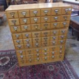 Three blonde oak Libraco bank of eighteen index drawers removed from a Cambridge University