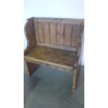 A pine pew - 80cm W x 91cm H