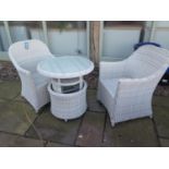 A Bramblecrest Monte Carlo bistro set with adjustable table and two arm chairs with cushions