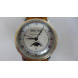 A Blancpain gold and steel Villaret triple date moon phase gents Swiss made wristwatch, very high