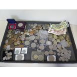 A collection of assorted coinage mainly British and four banknotes