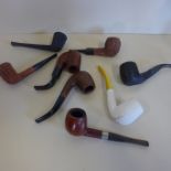 A collection of eight tobacco pipes, most by Sims, all used except clay pipe, but generally good