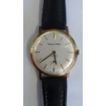 A Mappin and Webb 1979 9ct manual wind gents wristwatch - 35mm wide including button, on a leather