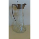 A silver top claret jug 26cm tall, generally good condition