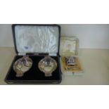 A pair of boxed sweetmeat dishes and a boxed silver mustard with spoon, total silver weight approx