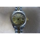 A ladies Rolex bi metal Oyster perpetual date bracelet wristwatch, 27mm wide including button, in