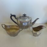 A Victorian silver teapot with ebony handle and finial together with an associated Victorian