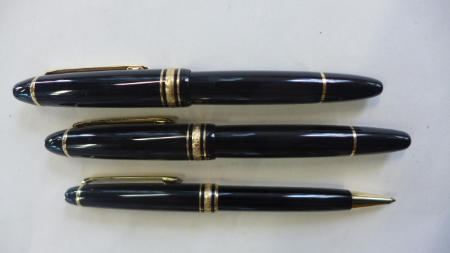 A Montblanc Meisterstuck gilt metal fountain pen with 14k nib, ballpoint pen and marker - pen set