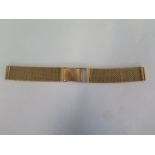 An 18ct yellow gold watch strap marked 750 - total length 17cm, weight approx 51 grams, some usage