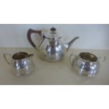 A three piece silver tea set, teapot, milk jug and sugar bowl, by Barber Brothers, Birmingham 1933 -