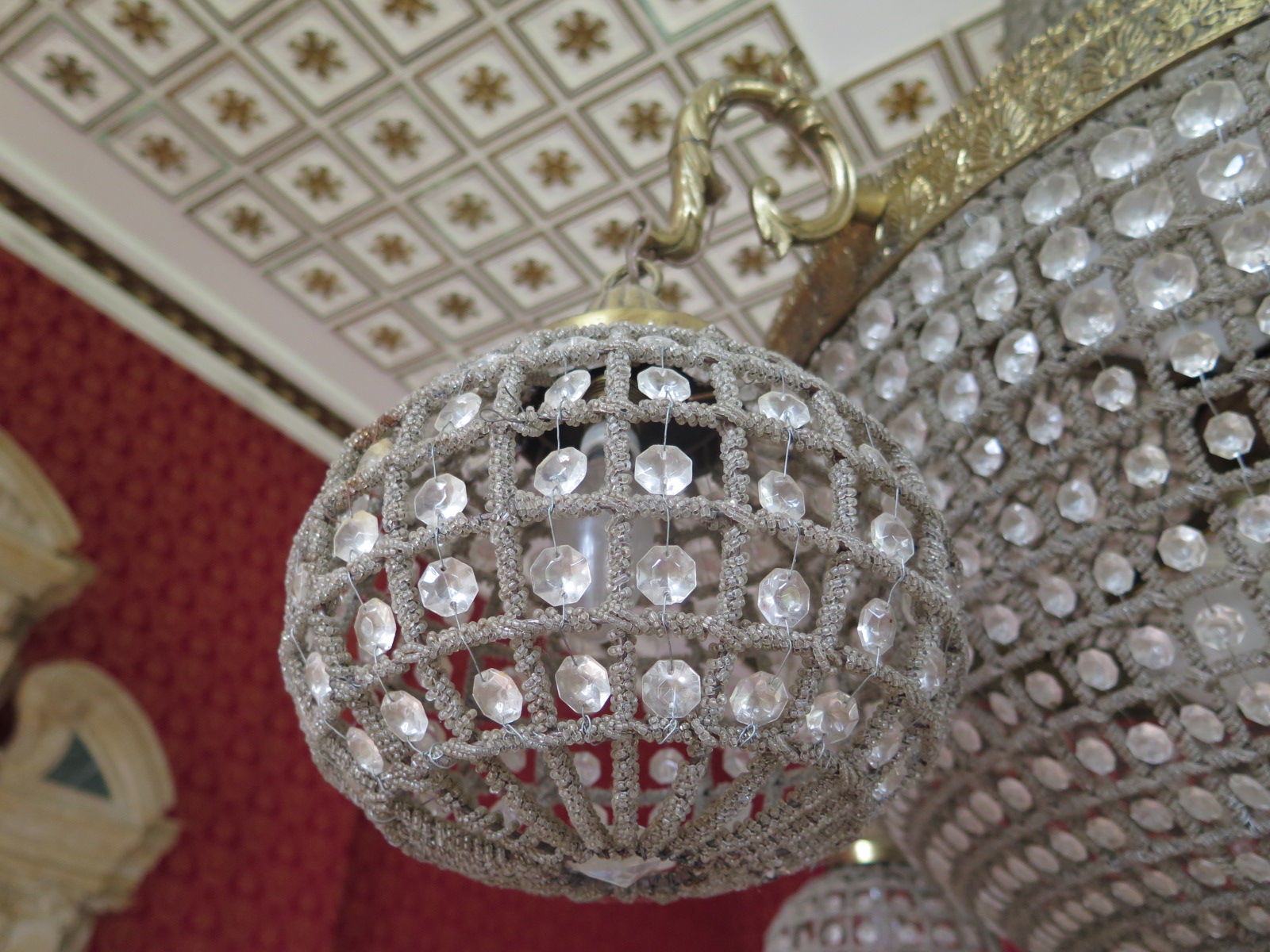 A large gilt chandelier, with ten central lights, with hanging glass drop, with four outer - Image 4 of 5