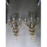 A pair of good quality brass three branch wall lights, 68cm high