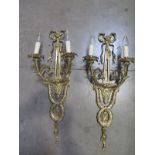 A pair of quality brass two branch wall lights - 72cm high