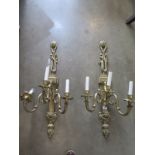 A pair of good quality brass three branch wall lights - 87cm high