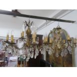 Two brass and glass chandeliers