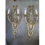 A pair of good quality two branch wall lights 73cm high