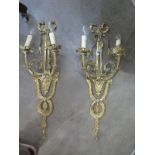 A pair of good quality two branch wall lights 73cm high