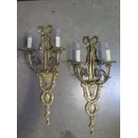 A pair of quality brass two branch wall lights - 72cm high