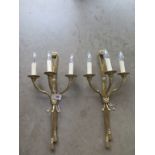 A pair of good quality three branch brass wall lights - 59cm High