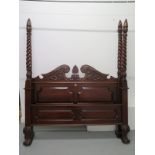 A mahogany coloured 4 poster double bed 175cm wide