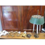 A selection of four wall lamps and one ornate table lamp