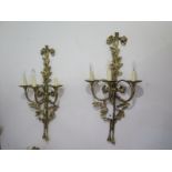 A pair of good quality brass three branch wall lights, 86cm high