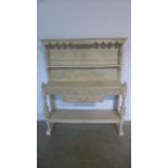 A 19th century oak dresser with green man carving, in white with single drawer, approx 122cm wide,