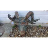 A cast iron wall mounting Rams Head mask - 47cm W x 38cm H