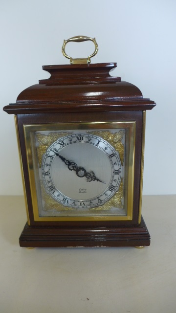 An 8 day mantle clock by Elliott London - 22cm tall