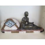 An Art Deco marble figural mantle clock 73cm long, in running order, some chips to marble