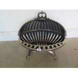 A Regency style steel fire basket 45cm wide