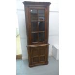 A modern oak full height corner cupboard, dismantles into two parts, in good condition, 200cm H x