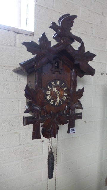 A black forest cuckoo clock - 50cm tall