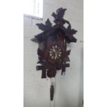 A black forest cuckoo clock - 50cm tall