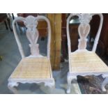 A pair of cane seated side chairs in a limed effect finish - 104cm tall