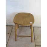 An early 20th century stripped and waxed beach stool - in good condition