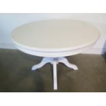 A white painted circular dining table - 78cm tall x 119cm diameter