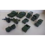 Eight Dinky toys military die-cast model vehicles, two Centurian tanks, military ambulance including