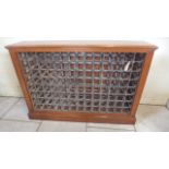 A large wine rack holds 104 bottles, made by a local craftsman to a high standard, 99cm tall x 141cm