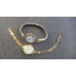 A 9ct yellow gold Tudor ladies manual wind wristwatch on 9ct strap, running but strap broken and