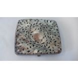 An oriental white metal pierced cigarette case, approx 2.7 troy oz, the case is very soft so has